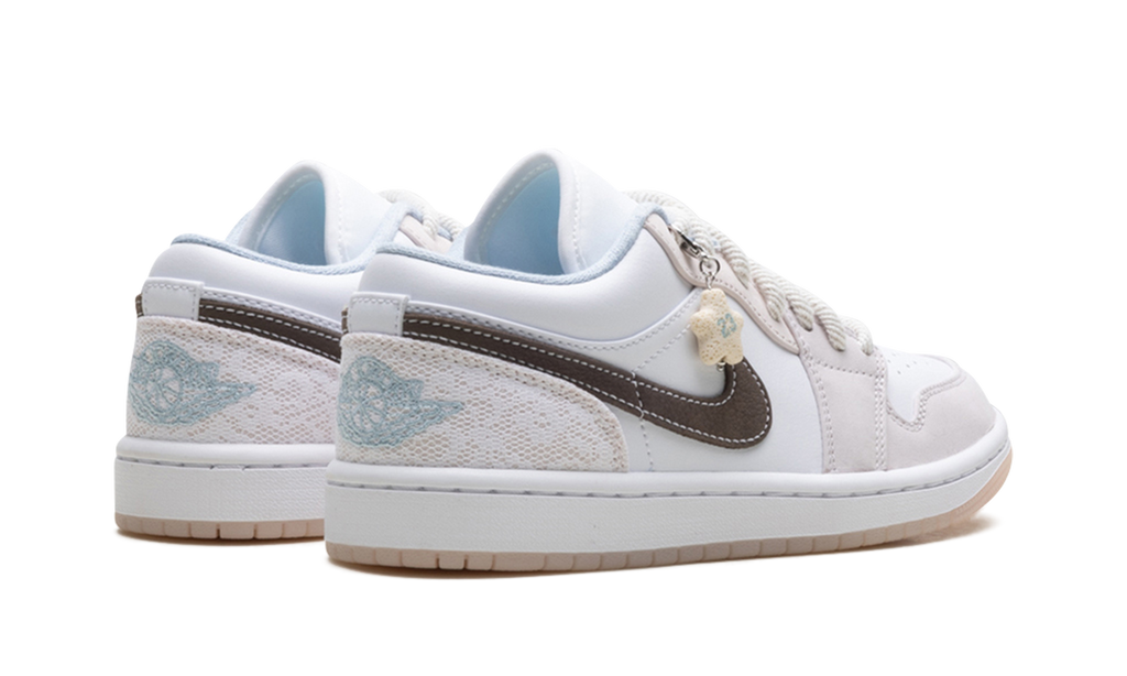Jordan 1 Low WMNS "Coral" IB8859 101